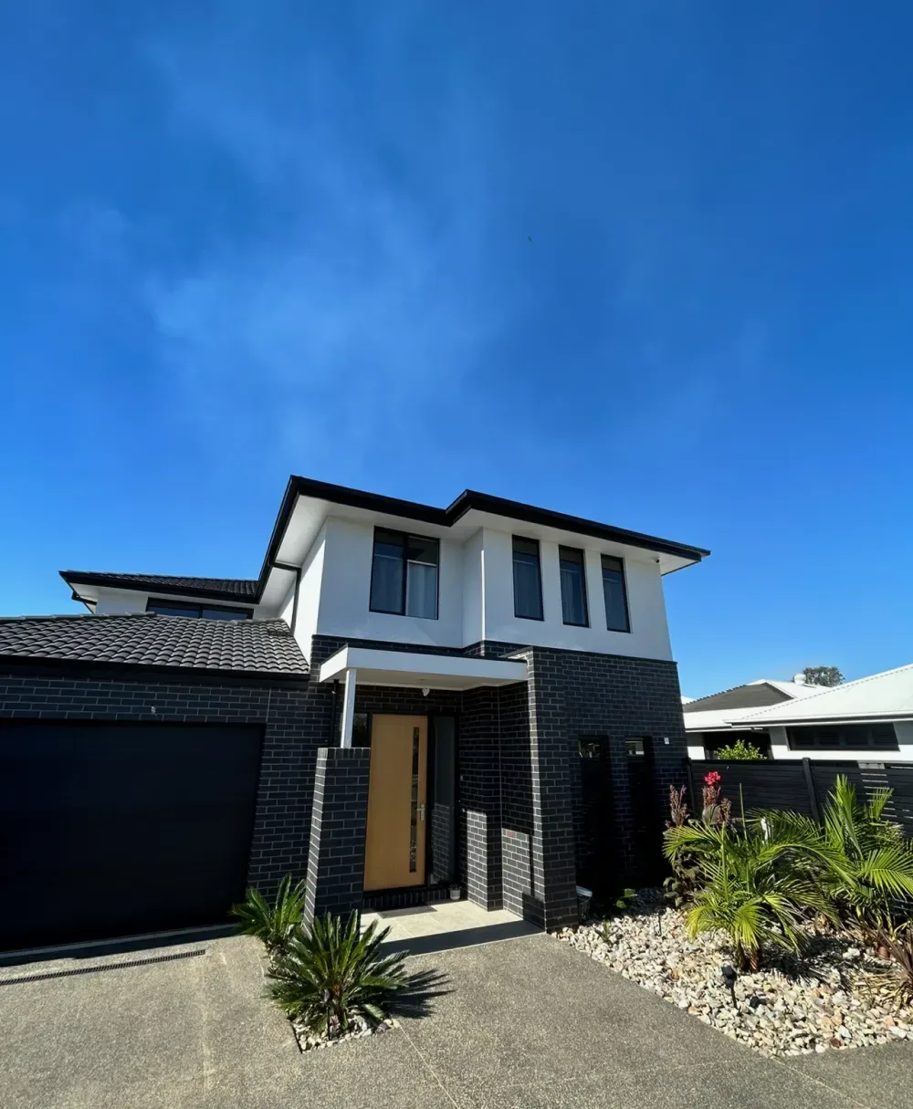 Exterior brick and render painting job.